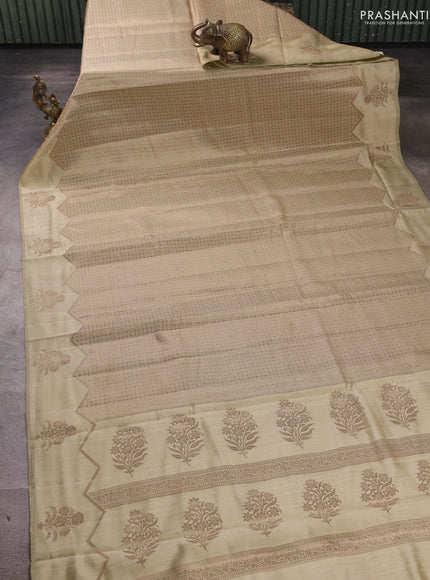 Chiniya silk saree pastel green with allover thread & zari brocade pattern and woven border
