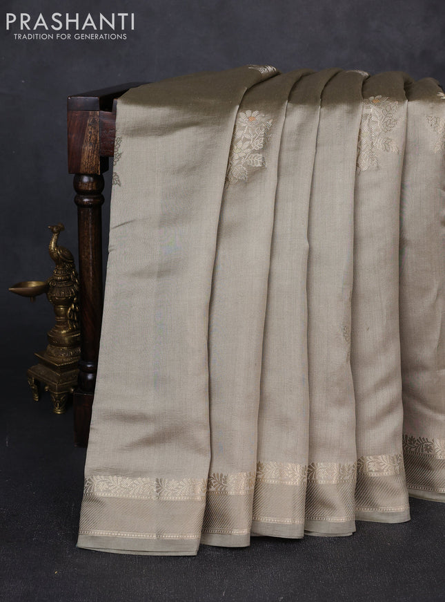 Chiniya silk saree pastel grey with zari woven buttas and rettapet zari woven border