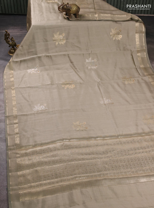 Chiniya silk saree pastel grey with zari woven buttas and rettapet zari woven border