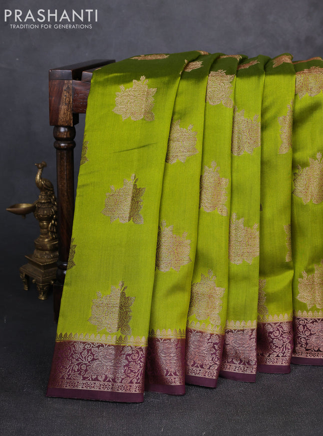 Chiniya silk saree light green and deep wine shade with allover thread & zari woven buttas and woven border