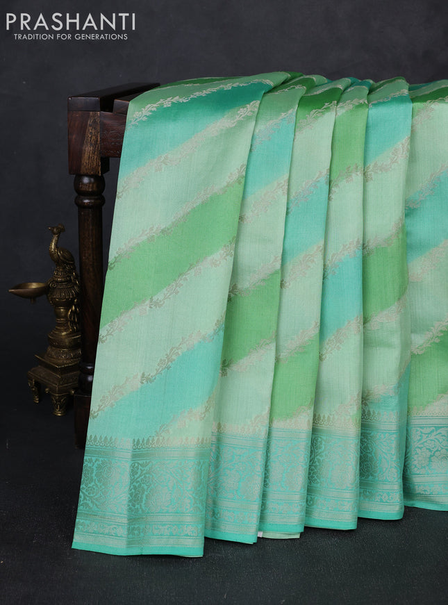 Chiniya silk saree teal green with allover thread & zari weaves and zari woven border