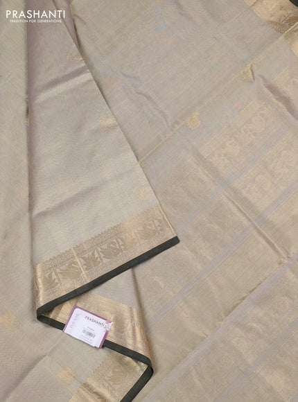 Kanchipuram silk cotton saree beige and olive green with zari woven buttas and zari woven border