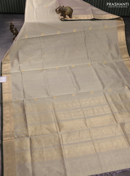 Kanchipuram silk cotton saree beige and olive green with zari woven buttas and zari woven border