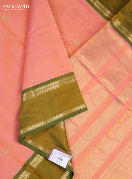 Kanchipuram silk cotton saree peach shade and mehendi green with zari woven buttas and rettapet zari woven border