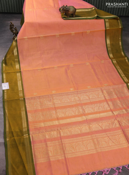 Kanchipuram silk cotton saree peach shade and mehendi green with zari woven buttas and rettapet zari woven border