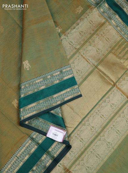 Kanchipuram silk cotton saree dual shade of greenish orange and green with zari woven buttas and rettapet zari woven border