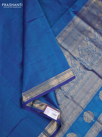 Kanchipuram silk cotton saree peacock blue with plain body and temple design zari woven border