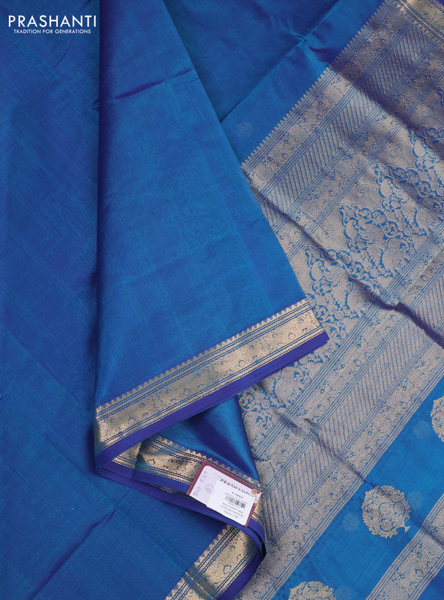 Kanchipuram silk cotton saree peacock blue with plain body and temple design zari woven border
