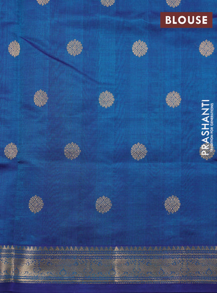 Kanchipuram silk cotton saree peacock blue with plain body and temple design zari woven border