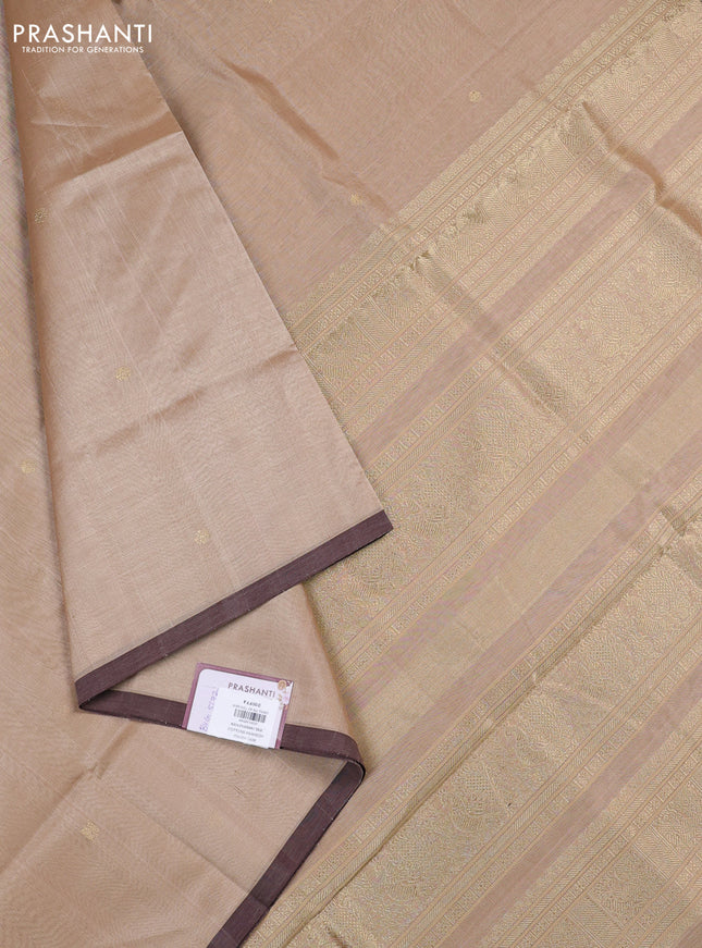 Kanchipuram silk cotton saree beige and brown shade with zari woven buttas and piping border