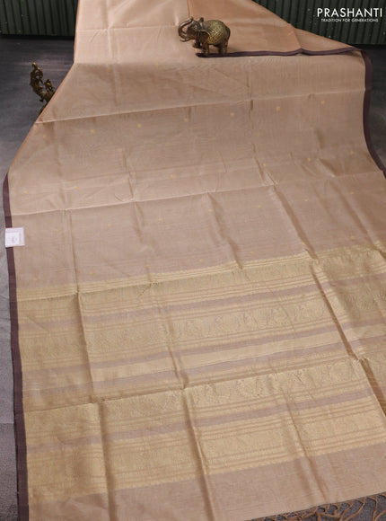 Kanchipuram silk cotton saree beige and brown shade with zari woven buttas and piping border