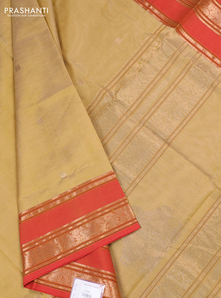 Kanchipuram silk cotton saree sandal and orange with zari woven buttas and rettapet zari woven border