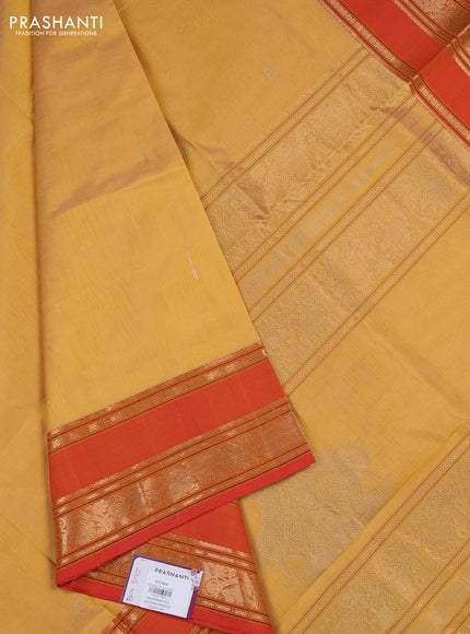 Kanchipuram silk cotton saree yellow and orange with zari woven buttas and rettapet zari woven border
