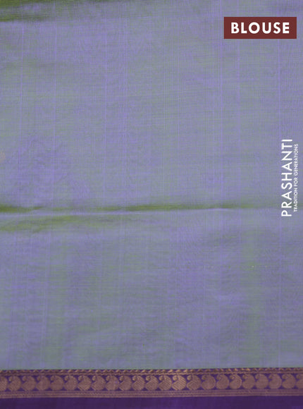 Kanchipuram silk cotton saree dual shade of green and purple with zari woven buttas and small zari woven border