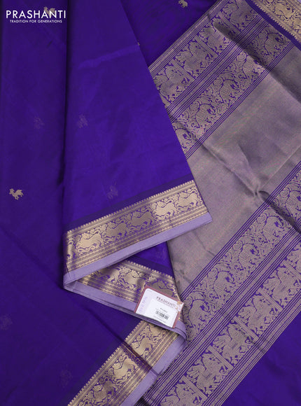 Kanchipuram silk cotton saree violet with zari woven buttas and temple design zari woven border