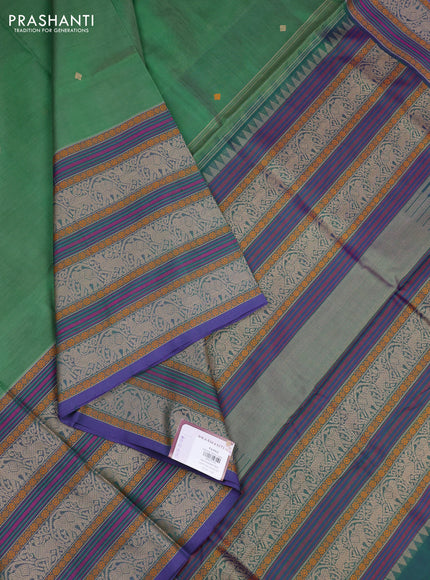 Kanchipuram silk cotton saree green and purple with thread woven buttas and long thread woven border