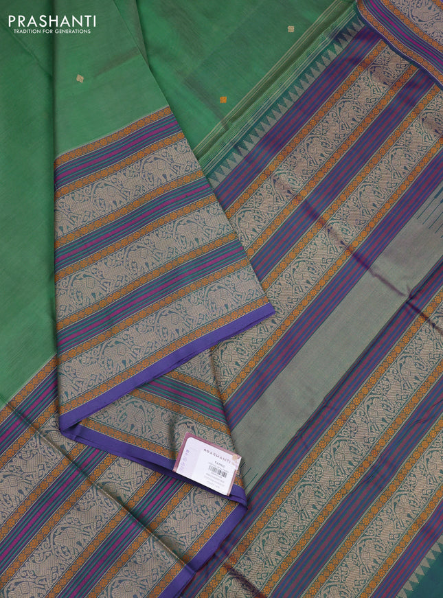 Kanchipuram silk cotton saree green and purple with thread woven buttas and long thread woven border