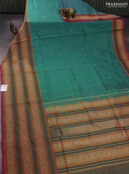 Kanchipuram silk cotton saree teal green and pink shade with thread woven buttas and long thread woven border