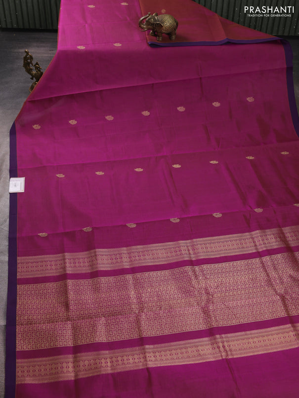 Kanchipuram silk cotton saree magenta pink and purple with zari woven buttas and piping border