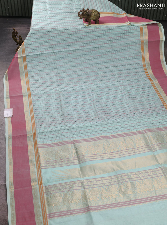 Kanchipuram silk cotton saree mild teal and peach pink with allover thread checks & 1000 buttas and rettapet zari woven border