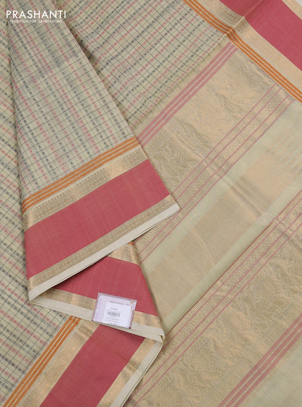 Kanchipuram silk cotton saree cream and peach pink with allover thread checks & 1000 buttas and rettapet zari woven border