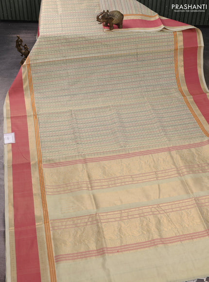 Kanchipuram silk cotton saree cream and peach pink with allover thread checks & 1000 buttas and rettapet zari woven border
