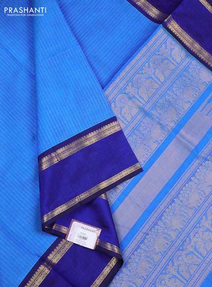 Kanchipuram silk cotton saree blue and navy blue with allover zari weaves and rettapet zari woven border