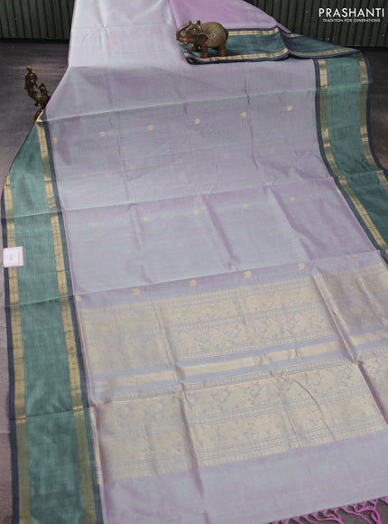 Kanchipuram silk cotton saree dual shade of green and bottle green with zari woven buttas and rettapet zari woven border