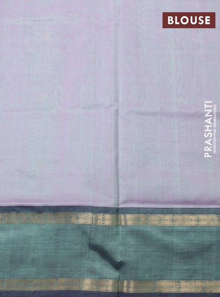Kanchipuram silk cotton saree dual shade of green and bottle green with zari woven buttas and rettapet zari woven border