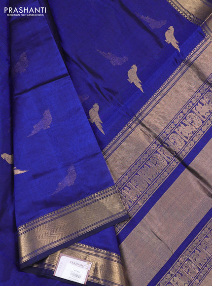 Kanchipuram silk cotton saree navy blue with zari woven buttas and temple design zari woven border