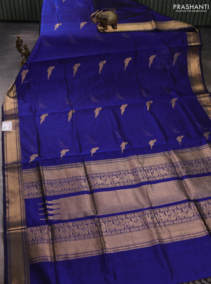 Kanchipuram silk cotton saree navy blue with zari woven buttas and temple design zari woven border