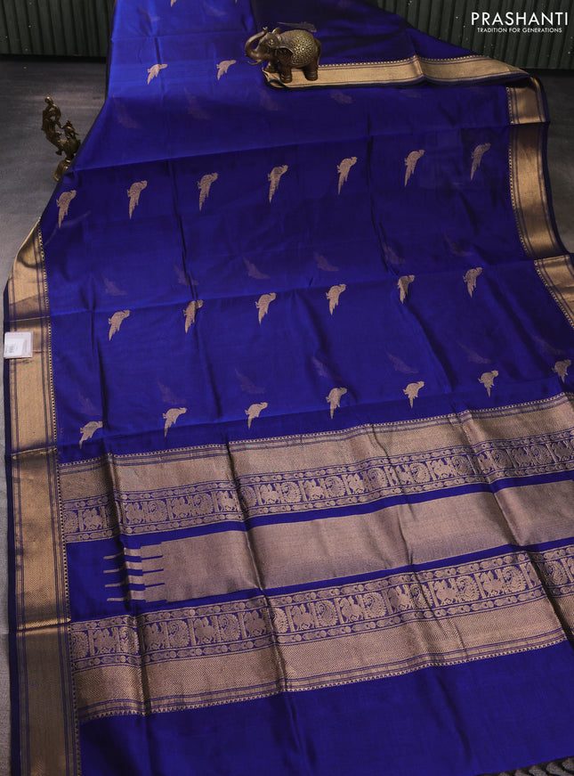 Kanchipuram silk cotton saree navy blue with zari woven buttas and temple design zari woven border