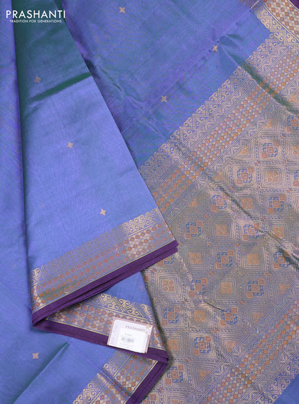 Kanchipuram silk cotton saree dual shade of bluish green and purple with zari woven buttas and zari woven border