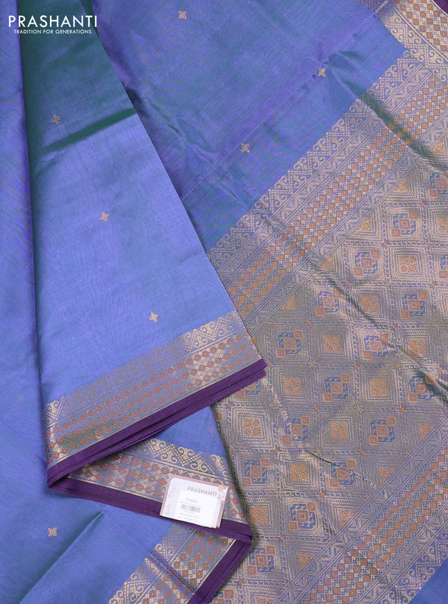 Kanchipuram silk cotton saree dual shade of bluish green and purple with zari woven buttas and zari woven border