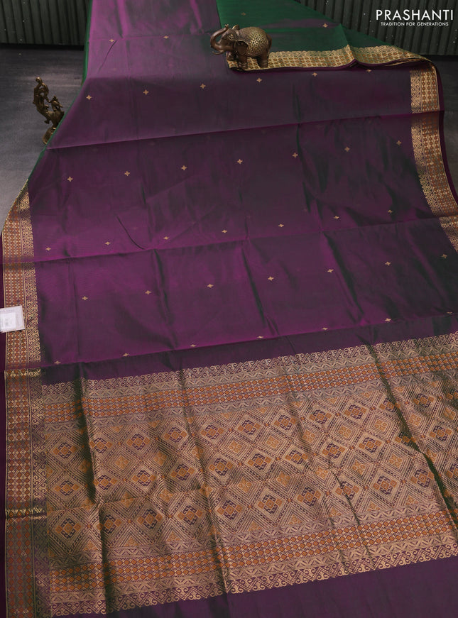 Kanchipuram silk cotton saree dual shade of greenish purple and wine shade with zari woven buttas and zari woven border