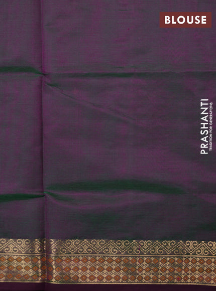 Kanchipuram silk cotton saree dual shade of greenish purple and wine shade with zari woven buttas and zari woven border