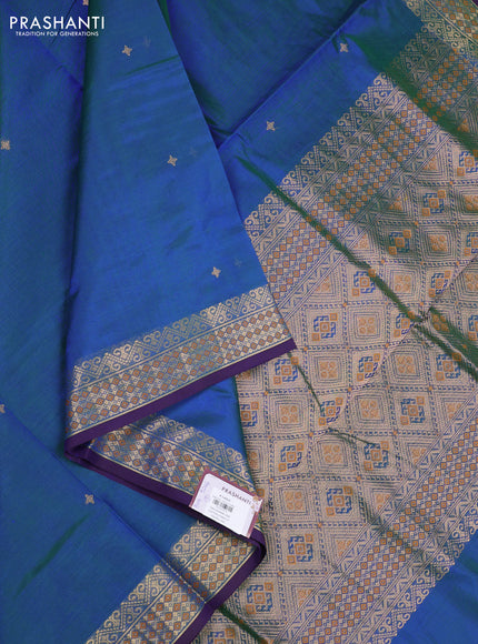 Kanchipuram silk cotton saree dual shade of bluish green and purple with zari woven buttas and zari woven border