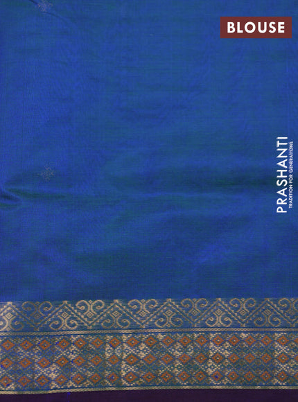 Kanchipuram silk cotton saree dual shade of bluish green and purple with zari woven buttas and zari woven border