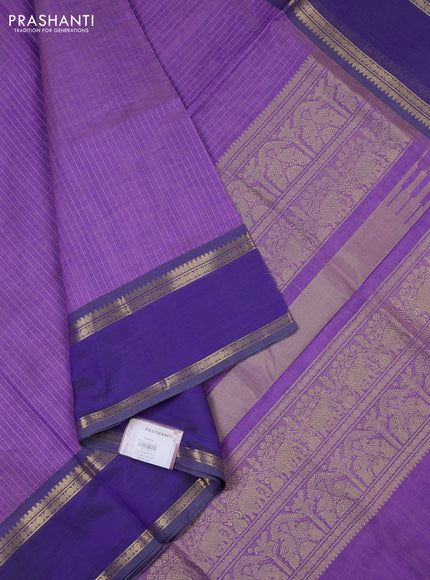 Kanchipuram silk cotton saree lavender and pastel violet with allover zari weaves and rettapet zari woven border