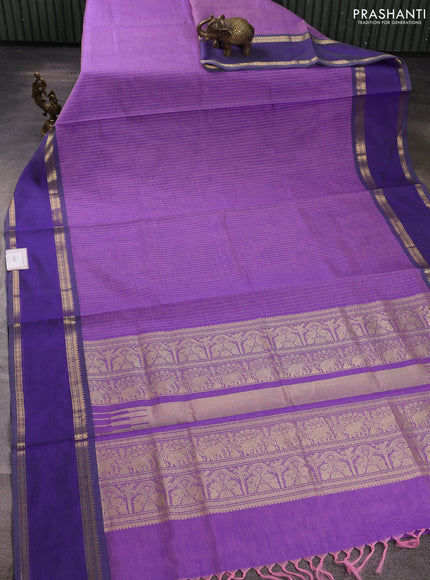 Kanchipuram silk cotton saree lavender and pastel violet with allover zari weaves and rettapet zari woven border