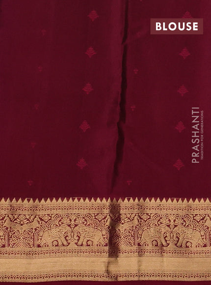 Kanchipuram silk saree dark blue and magenta pink with allover zari woven 1000 buttas and rich zari woven border