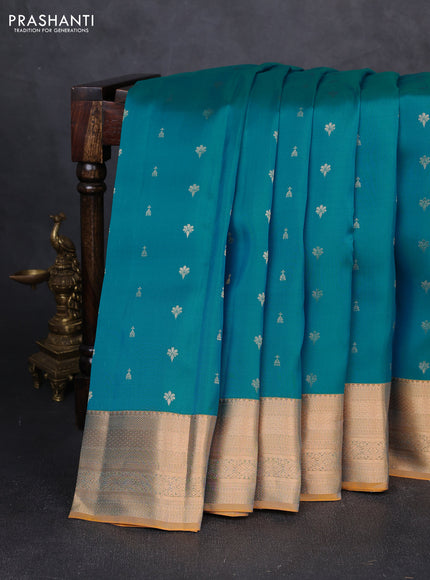Kanchipuram silk saree teal blue and mustard yellow with allover zari woven 1000 buttas and rich zari woven border