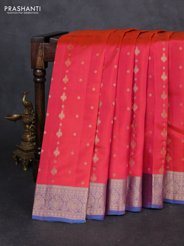 Kanchipuram silk saree dual shade of pinkish orange and blue with allover zari woven 1000 buttas and rich zari woven border