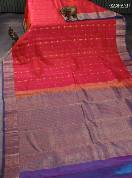 Kanchipuram silk saree dual shade of pinkish orange and blue with allover zari woven 1000 buttas and rich zari woven border
