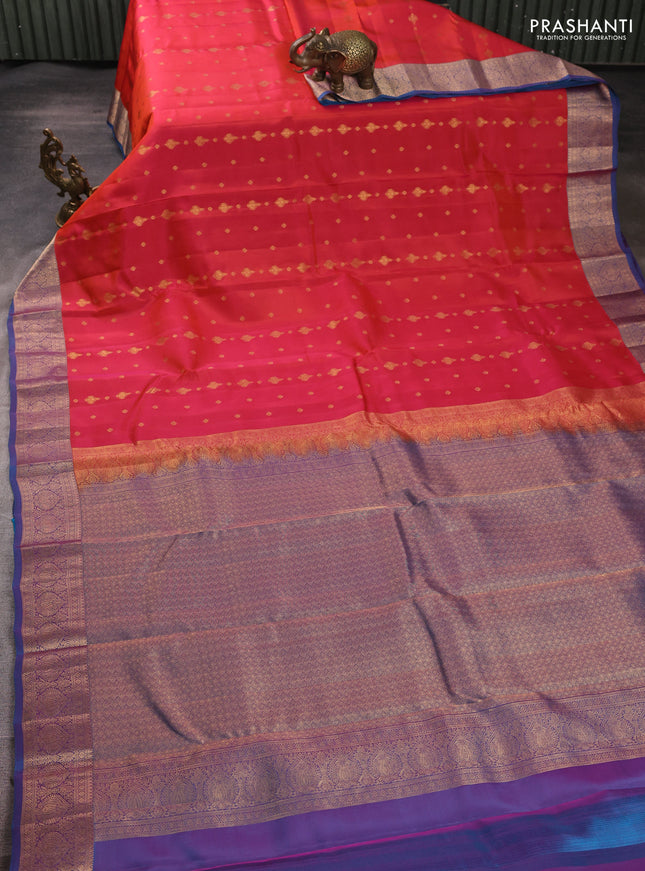 Kanchipuram silk saree dual shade of pinkish orange and blue with allover zari woven 1000 buttas and rich zari woven border