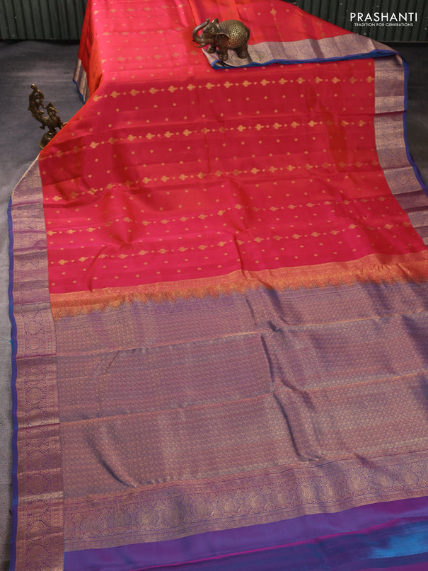 Kanchipuram silk saree dual shade of pinkish orange and blue with allover zari woven 1000 buttas and rich zari woven border