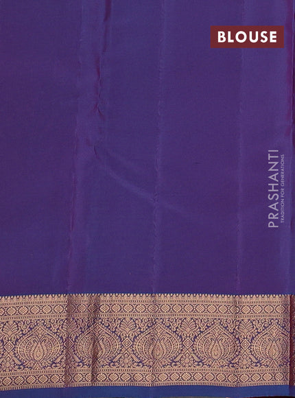 Kanchipuram silk saree dual shade of pinkish orange and blue with allover zari woven 1000 buttas and rich zari woven border