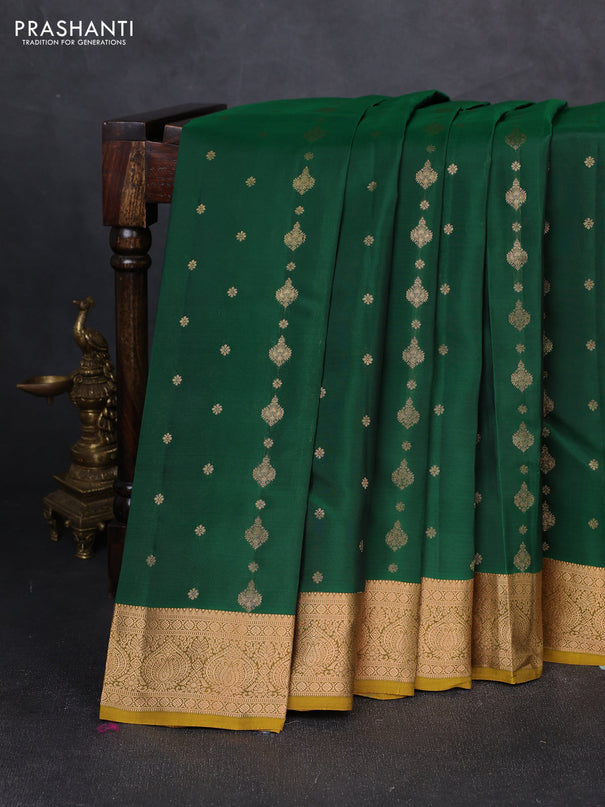 Kanchipuram silk saree green and dark mustard with allover zari woven 1000 buttas and rich zari woven border