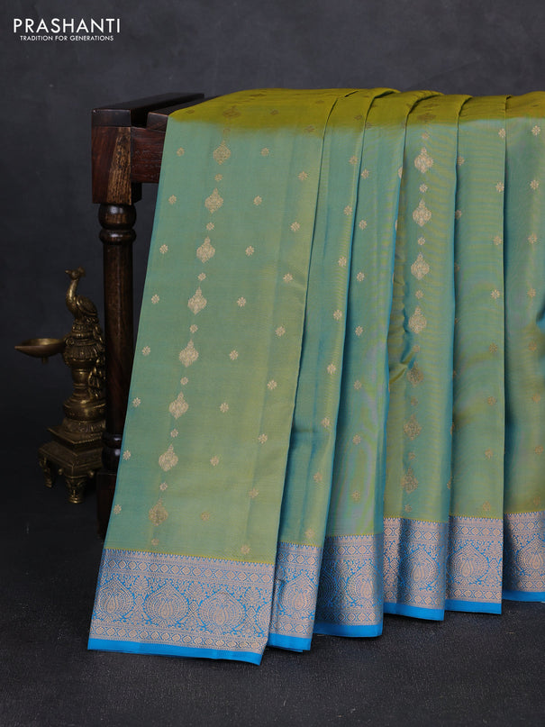 Kanchipuram silk saree dual shade of light green and cs blue with allover zari woven 1000 buttas and rich zari woven border