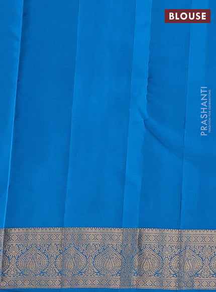 Kanchipuram silk saree dual shade of light green and cs blue with allover zari woven 1000 buttas and rich zari woven border